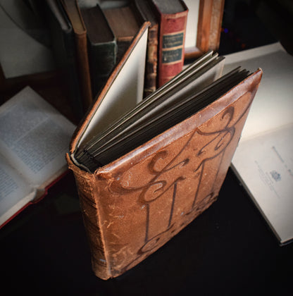 Leather bound antique photo album