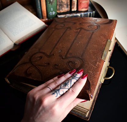 Leather bound antique photo album