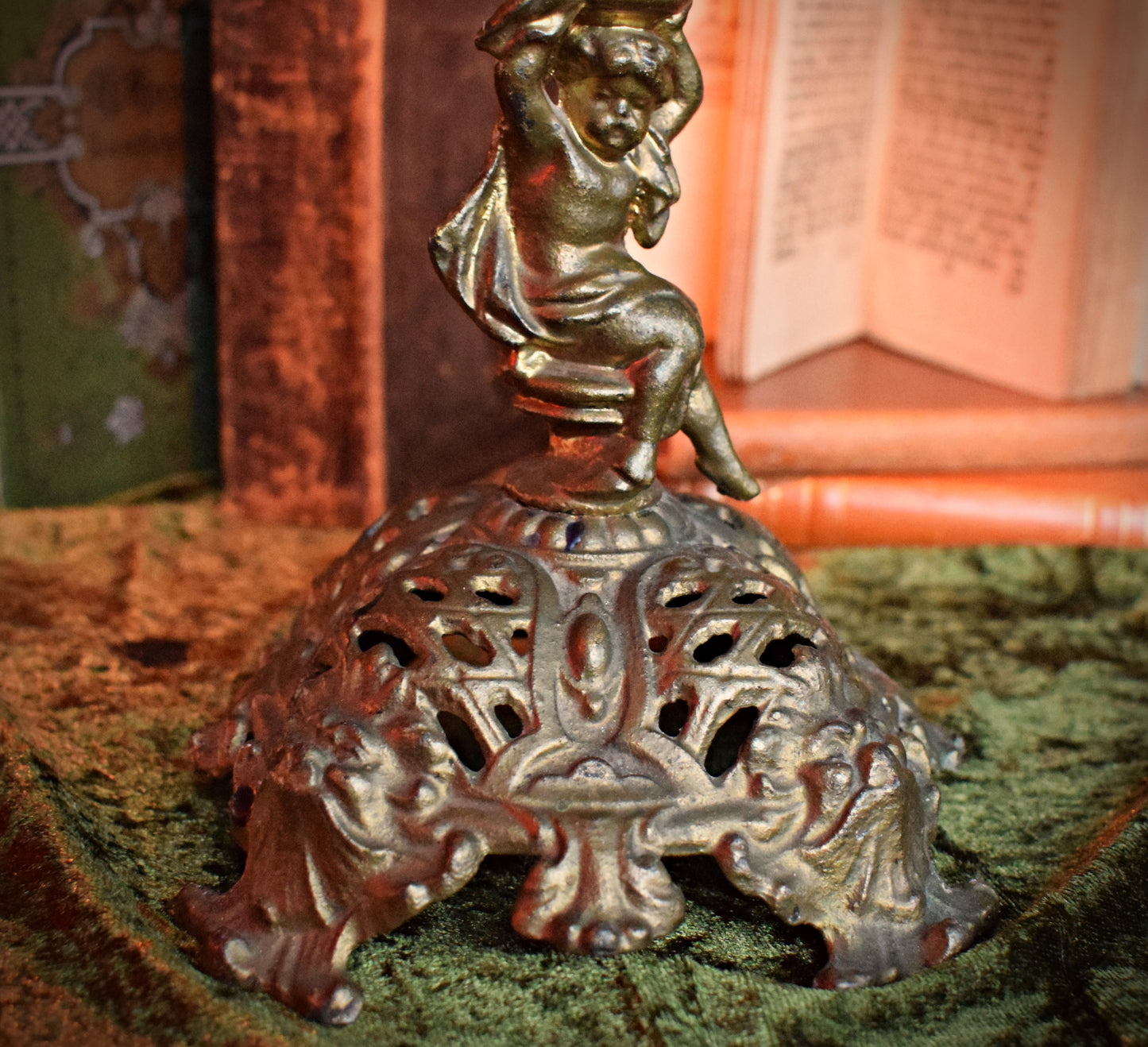 Antique cherub candle holder